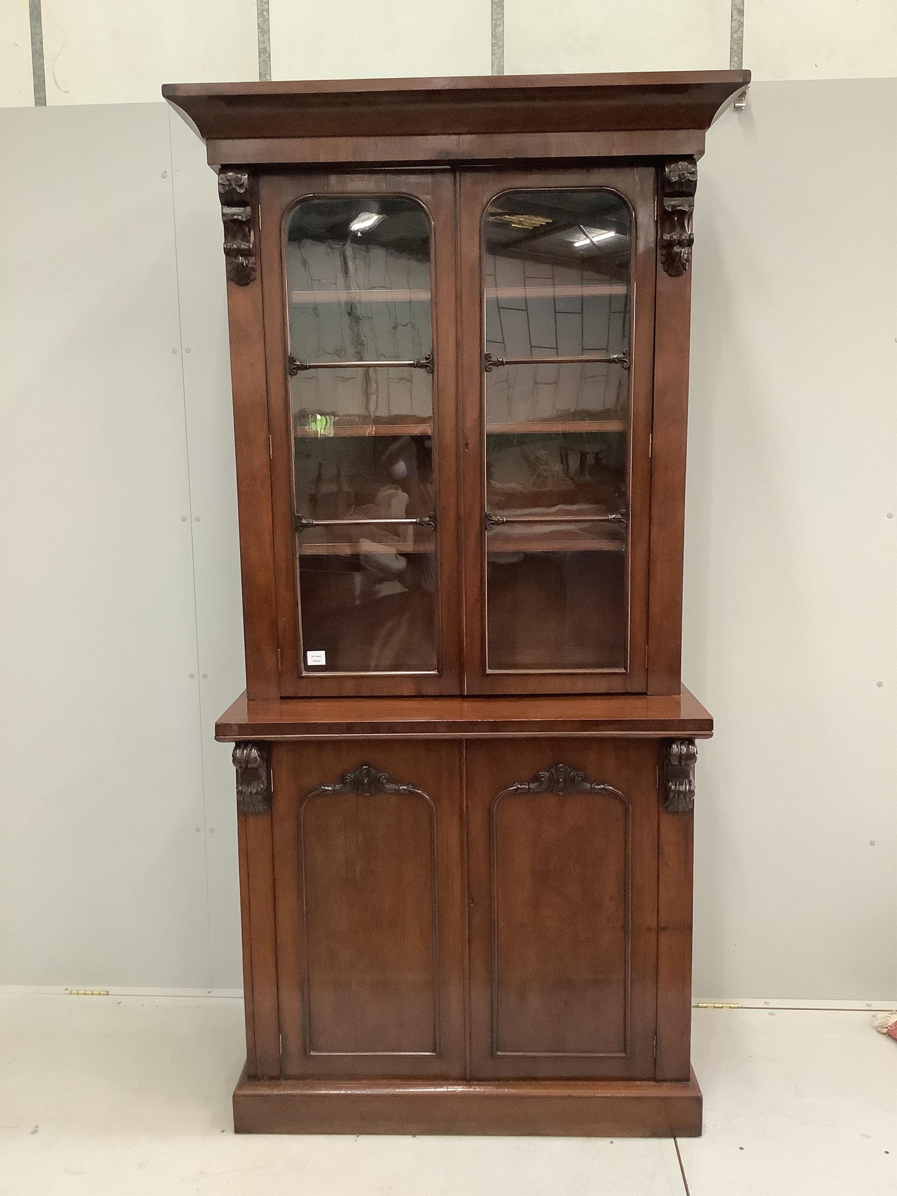 A Victorian mahogany chiffonier bookcase, width 105cm, depth 50cm, height 224cm. Condition - fair